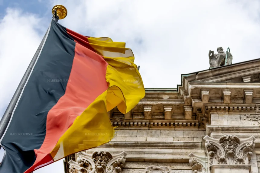 almanya vinnikava german flag waving in front of the building in mun 2022 11 14 05 19 37 utc