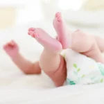 baby lying in bed 2025 04 04 09 52 44 utc