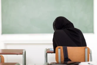 Student Wearing Hijab in Classroom