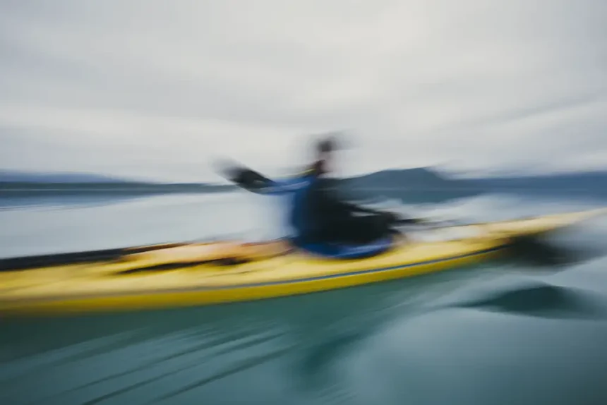 man sea kayaking inan inlet on the alaska coastlin 2025 04 04 05 36 12 utc