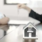 real estate agent broker hand over the house key t 2025 01 10 18 27 13 utc